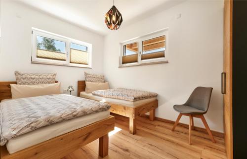 מיטה או מיטות בחדר ב-Zeitlos