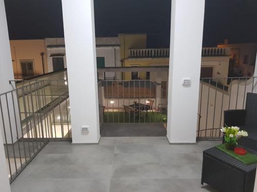 a view from the balcony of a apartment at night at Summer in Sud in Porto Cesareo