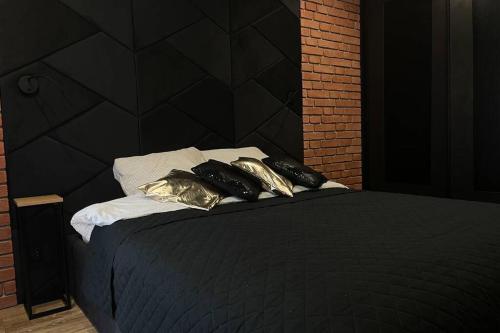 Postel nebo postele na pokoji v ubytování Apartament Manufaktura z bezpłatnym parkingiem