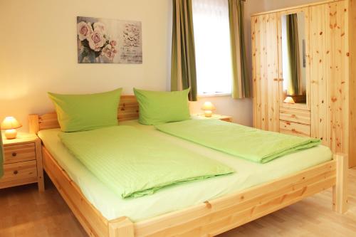 Postel nebo postele na pokoji v ubytování Ferienhaus Segebrecht