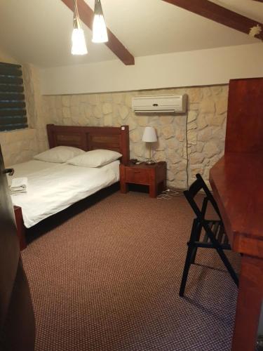 Postel nebo postele na pokoji v ubytování Mpoint Motel