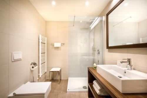 Vonios kambarys apgyvendinimo įstaigoje Remisens BEL MORETTO - Hotel Metropol Annexe