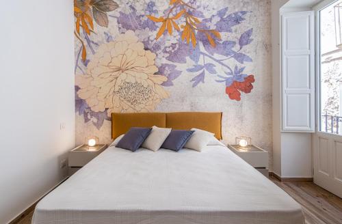 Posteľ alebo postele v izbe v ubytovaní FLOWER SUITE B&B