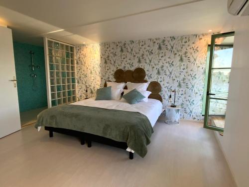Postel nebo postele na pokoji v ubytování LA VUE LOIRE Maison