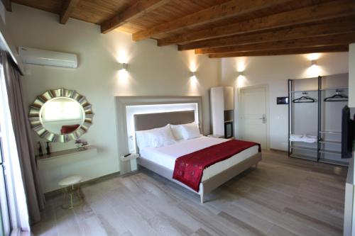 Postel nebo postele na pokoji v ubytování Hotel Relax Dhermi
