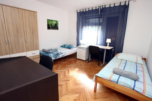 Postel nebo postele na pokoji v ubytování Apartment CVETKO