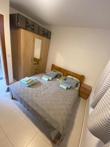 Postel nebo postele na pokoji v ubytování Miško Apartmani