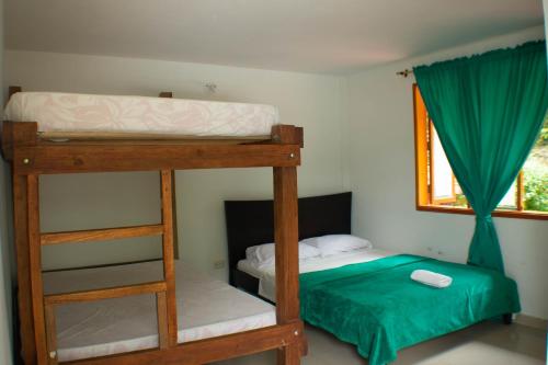 
Un ou plusieurs lits superposés dans un hébergement de l'établissement Hostel Casa Batara
