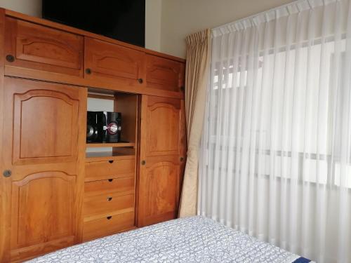 Una cama o camas en una habitación de Hospedaje Rodal