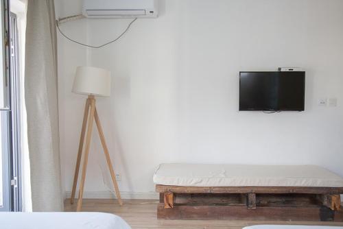 TV a/nebo společenská místnost v ubytování July Inn Weihai