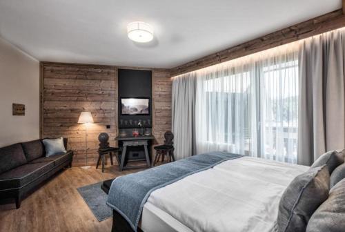 Postel nebo postele na pokoji v ubytování Hotel Tirolensis