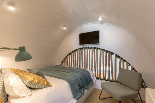 Letto o letti in una camera di Santo Bloom Luxury Villas