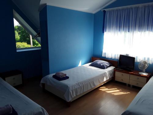 Ένα ή περισσότερα κρεβάτια σε δωμάτιο στο Willipu Guesthouse