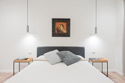 Postel nebo postele na pokoji v ubytování Taormina Mela's Holidays near the Historic Center