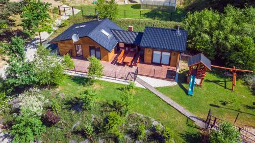Κήπος έξω από το Domek w lesie ze SPA