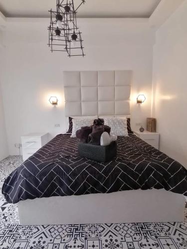 Soderberg By J&J Homes At Amani Grand Resort Residences Near Airportにあるベッド