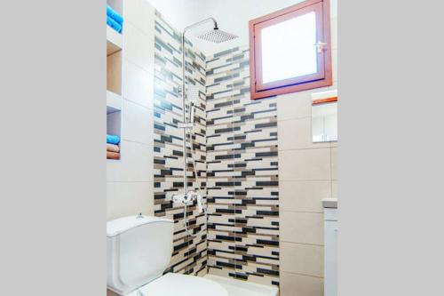 Ένα μπάνιο στο La MAISON di Angelo STUDIO