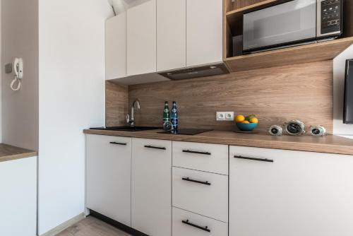 Kuchyňa alebo kuchynka v ubytovaní W Rent like home - Dyrekcyjna 1