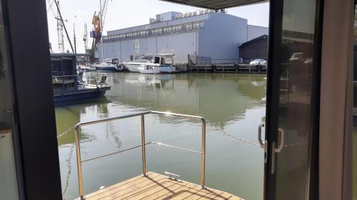 a view from a door of a boat in the water at La Mare Resort in Gothenburg