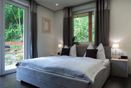 Ένα ή περισσότερα κρεβάτια σε δωμάτιο στο Domek nad Kryniczanką