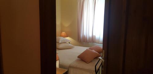 Katil atau katil-katil dalam bilik di Rooms & Apartment STELIO