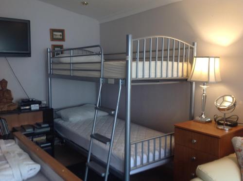 Двуетажно легло или двуетажни легла в стая в Grockle Nook Holiday Apartment