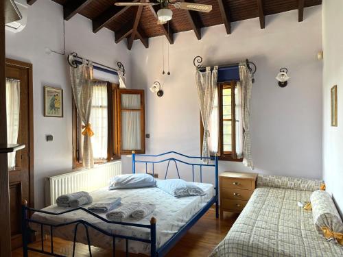 Ένα ή περισσότερα κρεβάτια σε δωμάτιο στο Villa Maira