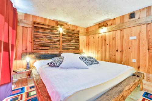 Ένα ή περισσότερα κρεβάτια σε δωμάτιο στο Holiday Home Dika