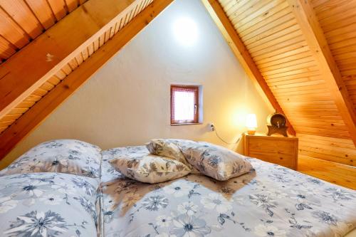 Ένα ή περισσότερα κρεβάτια σε δωμάτιο στο Holiday Home Dika