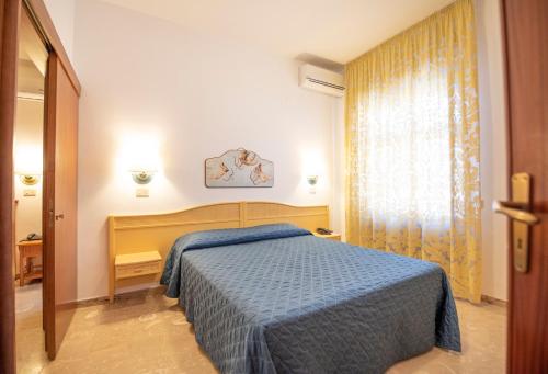 Ένα ή περισσότερα κρεβάτια σε δωμάτιο στο Agave Superior Rooms