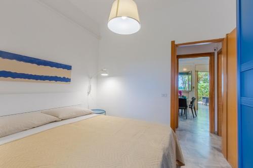 Ένα ή περισσότερα κρεβάτια σε δωμάτιο στο Villa Asami
