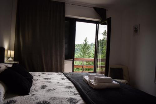 Postel nebo postele na pokoji v ubytování House Narta - Rastoke