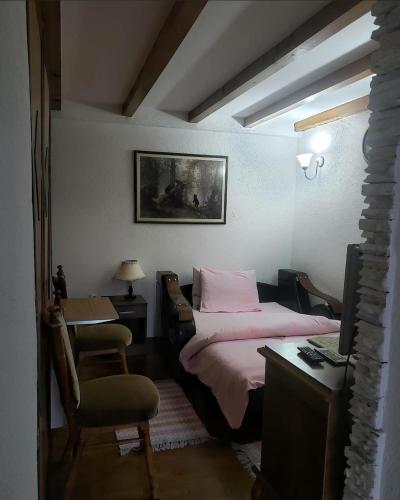 Una cama o camas en una habitación de Apartmani Vila Vjerra