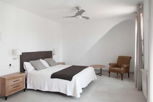 A bed or beds in a room at Villa Conchin Casa junto a Parque Natural