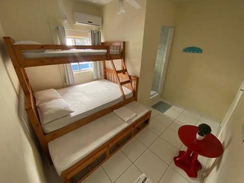 Un ou plusieurs lits dans un hébergement de l'établissement Caminho do Mar Hotel