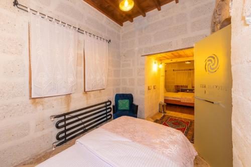 Postel nebo postele na pokoji v ubytování terracota hotel