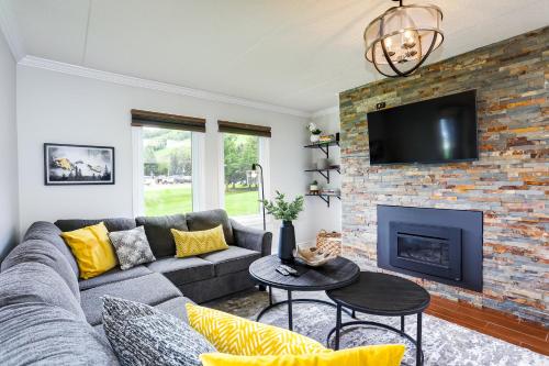 a living room with a couch and a fireplace at Blue Mountain, 3 BR - 108 Mountain Walk Chalet in Blue Mountains