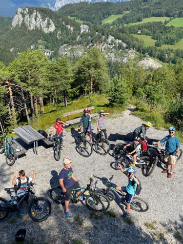 a group of people on bikes on a mountain at Alpin Rose Appartement in Semmering