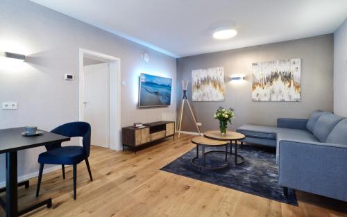 Istumisnurk majutusasutuses Erasmus Lodge - Ferienwohnungen zum Wohlfühlen