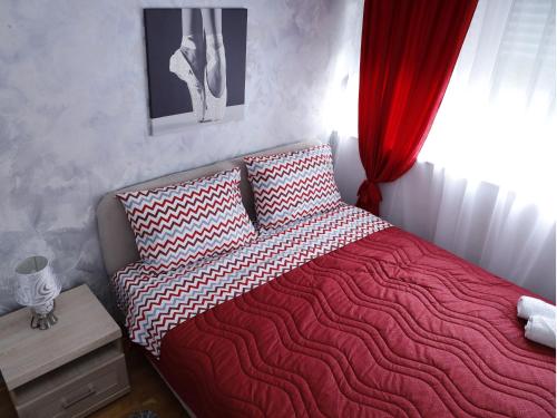 Ліжко або ліжка в номері Apartment Mona