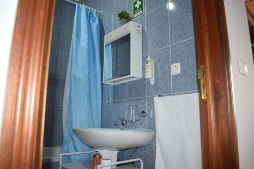 Ванная комната в Casa das hortências