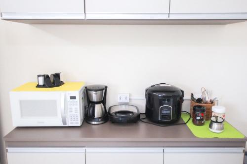 Dapur atau dapur kecil di Ypê Flats e Containers
