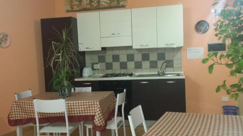 Η κουζίνα ή μικρή κουζίνα στο B&B Da Rosa