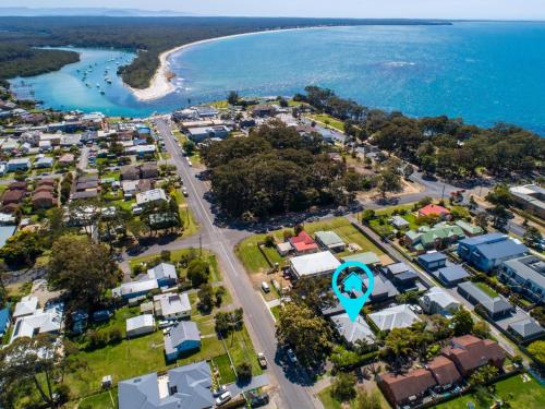 an aerial view of a suburb with a blue marker at Husky House by Experience Jervis Bay in Huskisson