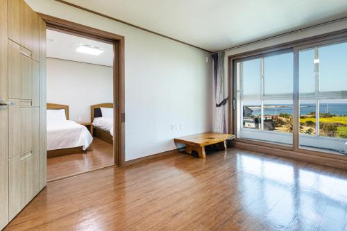 Postel nebo postele na pokoji v ubytování Hotel Amor