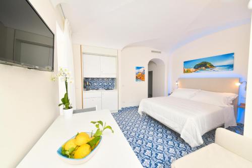 Postel nebo postele na pokoji v ubytování Ischia Mavilan Luxury Apartments