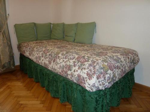 En eller flere senge i et værelse på Casa Titty