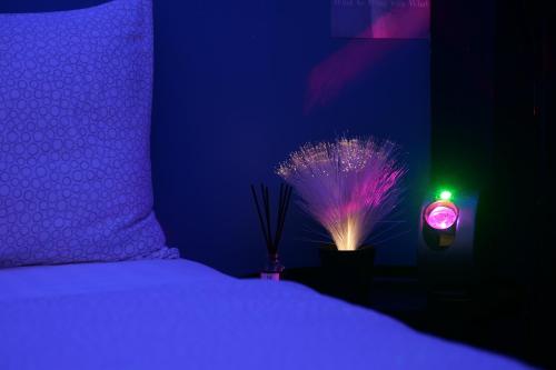 Ένα ή περισσότερα κρεβάτια σε δωμάτιο στο Sleep with Me Bangkok - BTS Phra Khanong