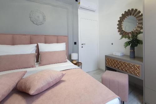 Postel nebo postele na pokoji v ubytování Villa Black Pearl