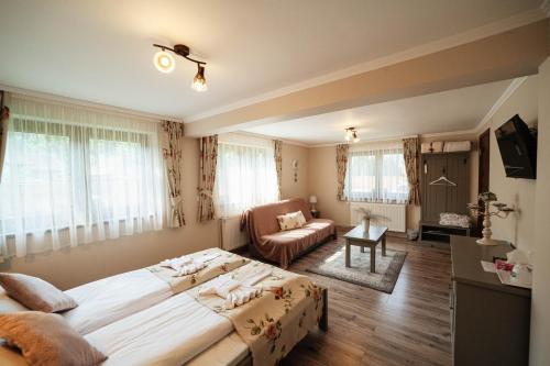 Ένα ή περισσότερα κρεβάτια σε δωμάτιο στο Vén Diófa